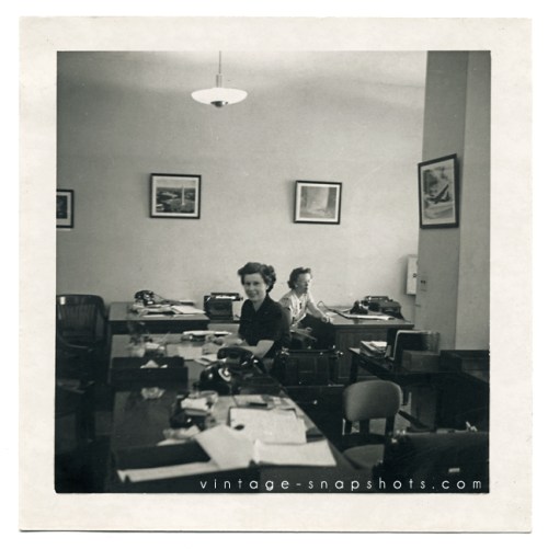 Vintage photo of an office in the 1950s.