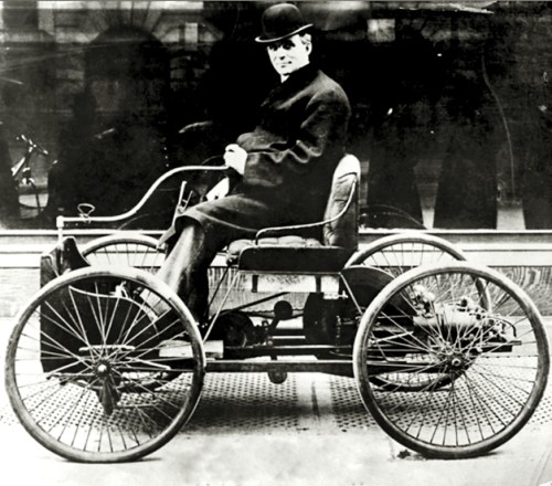 Early Ford automobile, the quadricycle, with Henry Ford driving