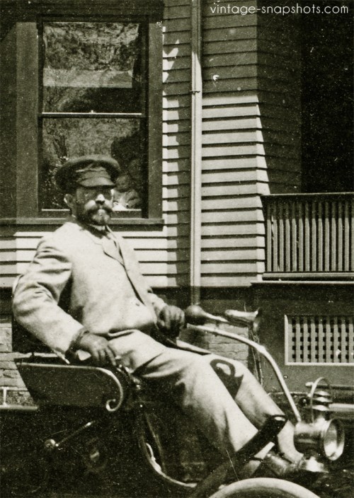 People gaze out of a window at the newest thing: the car