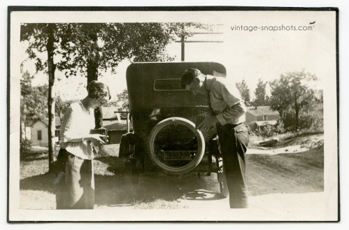 Great c. 1920s vintage photo of a couple pointing their Kodak cameras at each other
