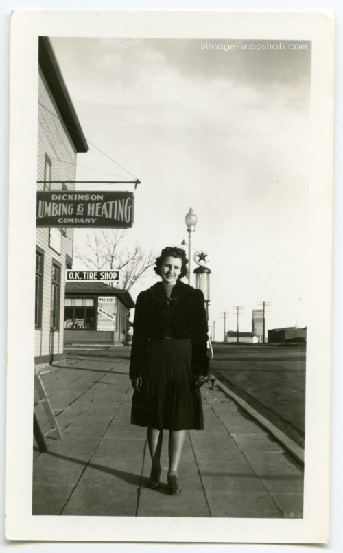 Vintage snapshot of woman on the street in small town in North Dakota