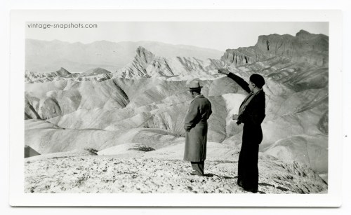 Vintage snapshot of couple in Death Valley barren moonscape, circa 1920s