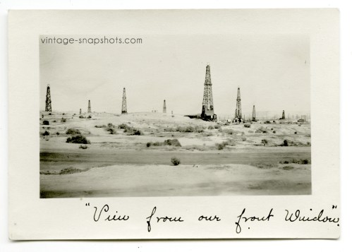 Vintage circa 1910s snapshot of il wells across the street from home